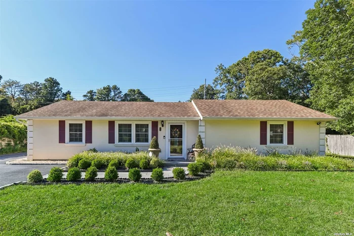 Welcome to your beautiful 4-bedroom ranch-style home that effortlessly blends comfort and style. With soaring ceilings and a sun-filled open floor plan, this home is perfect for entertaining. The spacious living room features warm wood tones, while the adjoining kitchen is a chef&rsquo;s dream with a large breakfast bar island, ample prep space, and sleek stainless steel appliances. The seamless flow from kitchen to dining area leads you out to a back patio oasis, ideal for al fresco dining and outdoor gatherings. The private, fully fenced yard offers peace of mind for children or pets, while the low-maintenance landscaping and ample parking on the asphalt driveway add to the home&rsquo;s convenience and curb appeal. Relax on the inviting front porch, or retreat to the spa-like bathroom with gorgeous tile work for a peaceful soak. With easy access to highways, this home is as practical as it is charming-offering both tranquility and convenience for commuters and day-trippers alike.