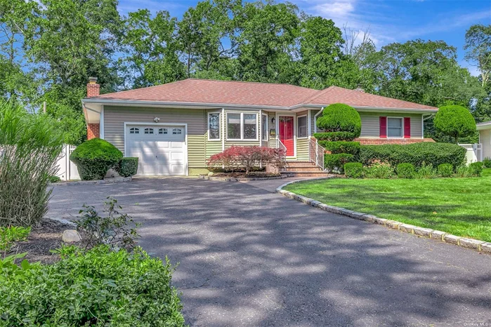 his charming ranch has been thoughtfully expanded from its original design, creating a spacious and open floor plan. Large bay windows at the front and back fill the home with natural light, and hardwood floors are featured in many rooms. The generous den offers a cozy atmosphere with a wood-burning fireplace and custom-built shelving. The primary bedroom has been enlarged, and its bath has radiant heat. Its updates include a new roof , CAC, windows and a brand-new cesspool. The basement provides an opportunity for more recreation space, while the one-car garage offers additional storage. The rear deck and yard are ideal for quiet enjoyment or gracious entertaining. Centrally located near shopping, fine dining, and major highways. Hauppauge Schools.