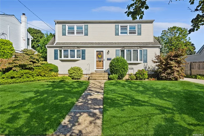 This beautiful Colonial home welcomes you with gleaming hardwood floors throughout the first floor, leading to a bright and inviting Formal Living Room. The Private Dining Room and spacious Family Room create a perfect flow for entertaining. The updated Eat-In Kitchen features modern appliances, making it a great space for everyday meals. A full bathroom is conveniently located on the first floor. Upstairs, you&rsquo;ll find a Large Main Bedroom, two additional well-sized bedrooms, and another full bathroom. The Full Basement includes a new washer and dryer, as well as a new furnace and hot water heater. The expansive backyard, stretching 136 feet deep, is a true outdoor retreat. Enjoy time on the private deck with a gazebo, surrounded by two apple trees. The property also includes a New Detached Garage and an in-ground sprinkler system to keep your lawn lush. Newer Roof only 9 years old. Located in a prime spot, this home is zoned for both East Meadow High School and Clarke High School. Don&rsquo;t miss out on this incredible opportunity!