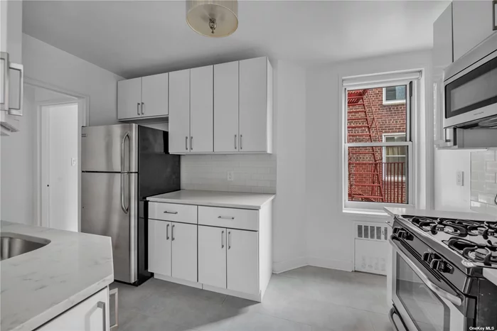 Just Listed, Spacious 2 Bed 1 Bath (Jr4) In Prime Location Of Flushing. Fully Renovated From Top To Bottom, Coop Apartment Features: Gorgeous White Cabinets, New Stainless Steel Appliences, Hardwood Floors Throughout, Walk-In Closets, New Doors, Window Treatments, Brand New Air Conditioners & Many More. Well Managed & Financially Healthy Building With 16H Doorman, Courtyard With Siting Area For Residents To Enjoy. -Shared Laundry -Very Low $1, 075 Maintenance -Indoor Garage $175 -No Sublet Allowed -NO Pet -Conveniently Located Close LIRR & 7 Train & Other Public Transportation, Shopping And The Well-Rated Schools.