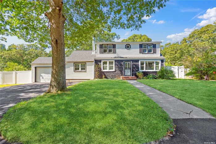 Fully renovated Expanded Cape with 6 bedrooms and 2.5 baths, offering a bright, open-concept layout. The kitchen features brand-new stainless steel appliances, quartz countertops, and plenty of cabinet space with the white shaker cabinets and black hardware. The living room and den share a wood-burning double sided fireplace, perfect for flexible living and entertaining. The property includes a garage, a large driveway, and a fenced-in half-acre yard, and a roof that is just one year old. The fully finished basement provides additional storage and laundry hook-up. The basement has egress windows and an outside entrance with a Bilco door, making it possible to convert into a rental unit, pending proper configuration and permits.