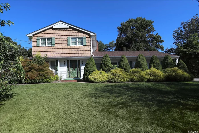 Wonderful opportunity for a new owner to take over this 4 bedroom Colonial in Hauppauge! This mid block home features 4 bedrooms and 1.5 baths. Excellent living space on the main floor with a welcoming entry floor, eat in kitchen, Living room and den. There&rsquo;s a full size basement that unfinished and ready for your touch. Upstairs there are 4 bedrooms and a full bathroom. Parking is not a problem with the private driveway and attached 2 car garage! The property also has in-ground sprinklers, 200 amp electric and a Bosun high effeciancy hot water heater!