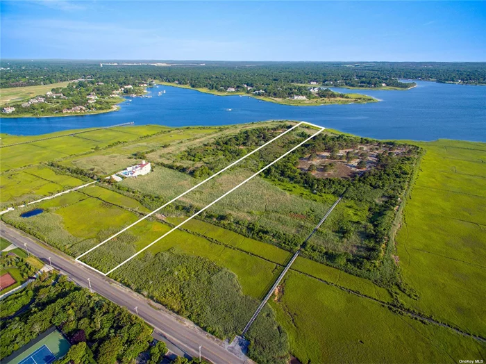 Bayfront Land in Coveted Quogue: This waterfront property is surrounded by preserved land and offers 114 feet of frontage on Shinnecock Bay as well as unobstructed, protected views.