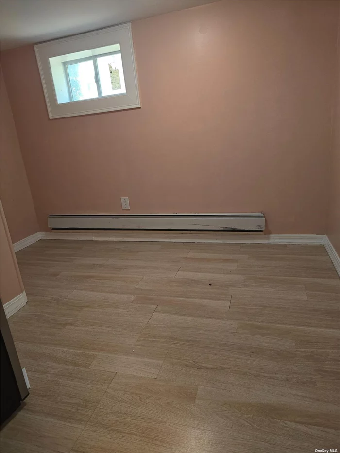 2 BR Lower-level apartments for rent. Half block from Hempstead turnpike. Close to shopping area and Queens. Lot of street parking. Utilities included.