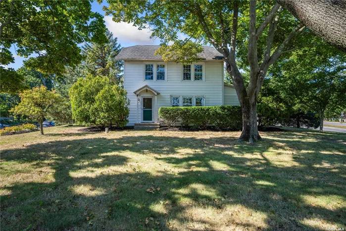 Charming Farmhouse with Modern Updates and Prime Location Perched on a hill at the corner of Route 48 and Marys Road, this charming 1, 350 sq ft farmhouse blends timeless character with thoughtful modern updates. Renovated in the early 2000s, the home boasts new electric, two-zone heating, a home security system, and an upgraded septic system, providing both comfort and convenience. The versatile home/office layout offers plenty of space and charm. Step through the tree-covered front entryway into a generous living room or through the back entrance into the foyer/mudroom. The ground floor includes two inviting bedrooms/private offices, one of which has a working brick fireplace. An enclosed porch, powder room, and a full unfinished basement provides extra storage and endless future possibilities. Upstairs, the second-floor retreat shines with a vaulted cathedral ceiling and ambient cove lighting, creating a warm and inviting atmosphere. With its large open living space, a kitchenette, a bedroom, and a full bath, this is a perfect space for guests or additional living quarters. Outside, the back deck is the ideal spot to unwind, dine alfresco, and watch the sunset. Nestled in a prime location, you can easily walk to Mattituck High School, the charming shops and eateries on Love Lane, the local library, as well as the LIRR and Hampton Jitney for seamless travel. With its mix of privacy, modern features, and proximity to everything Mattituck has to offer, this farmhouse is a true gem for those seeking charm and convenience.