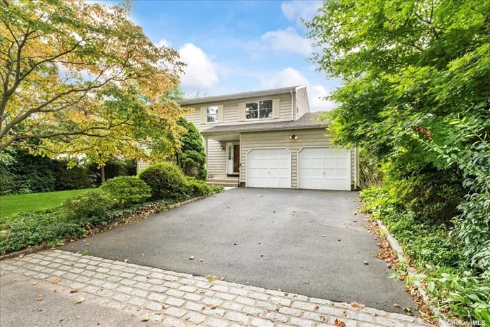 Welcome to this beautiful family home on Garfield Avenue. This house is located in the sought-after Hill Terrace Neighborhood. As you walk in the front door you enter a foyer with two large closets on your right and living room to your left. A spacious eat-in kitchen, formal dining room, 1/2 bath, and den with a wet bar and fireplace complete the first floor. The second floor has a master bedroom with a walk-in closet, en suite bathroom and vanity area. There are 3 additional bedrooms on this floor along with a full bathroom. This home also features a 2 car garage that can be accessed directly from the home through the den as well as full, unfinished basement. This home has central air conditioning and a patio with an awning in the backyard. It&rsquo;s an easy walk to all the local stores and shops, the Glen Head train station and Glenwood Landing Elementary School.