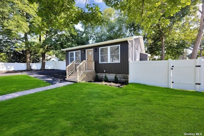 Introducing a brand new, fully renovated home located in the charming village of Lake Grove. This residence boasts low, low taxes Only 4K/year and energy-efficient construction, featuring newly insulated walls and ceilings. It has been upgraded with new electrical and plumbing systems. Central air throughout the entire home. Siding, windows and roofing are all new. The kitchen showcases elegant white shaker cabinets, stainless steel appliances, and a custom quartz countertop. The bathroom is equipped with a full tub and beautifully appointed finishes. This 3-bedroom, 1-bathroom home also includes a fully finished basement with an outside entrance. 2M2L!