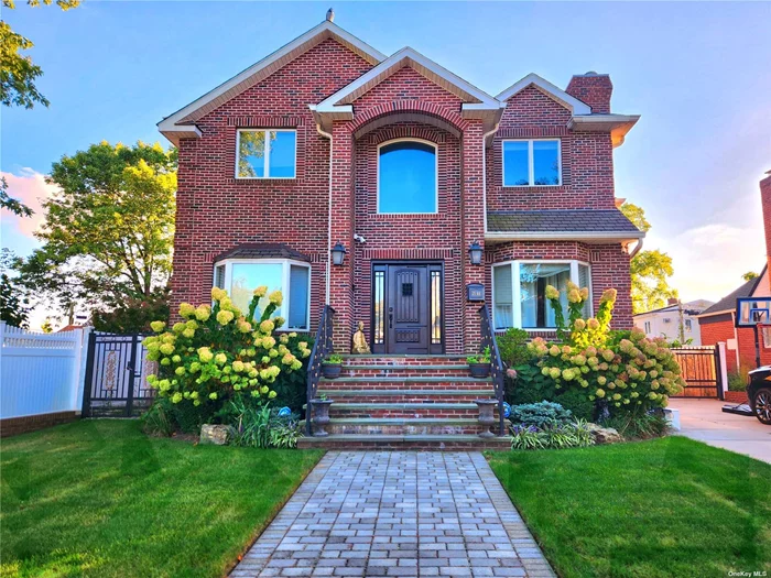 Welcome to your paradise home on a quiet tree-lined block! The house was CUSTOM-BUILT built and expanded in 2004 on a 60x100 lot and is comprised of a Full Brick exterior with massive above ground interior space of 2800sqft and a finished basement adding additional space of around 1400sqft. Upon entering you will be greeted by the Grand Foyer followed by the Living Room, Dining Room, Powder Room, Large Chef&rsquo;s Kitchen with Four Seater Island and Huge Open Layout with the Family Room. 2nd Floor offers a Primary Bedroom with Walk-In Closet, Vaulted Ceilings and en-suite Full Bath including Hot Tub plus a Shower. Additionally, there are 3 more spacious bedrooms along with a separate full bath. Basement is fully finished and is perfect for entertainment and recreation with Utility Rooms and Laundry rooms tucked away out of view. Backyard oasis includes an in-ground heated Salt-water Pool connected to the Hot Tub along with the garage/pool house overlooking the space. This home is equipped with 3-Zone Central A/C, Sprinklers, ADT Security System/Cameras, durable yet elegant Brazilian Cherry Wood throughout, 2 Gas Fireplaces, and a wide paved driveway that can fit at least 5-6 cars. Kitchen & bathrooms were updated about 5 years ago. Location is convenient to lots of shops, restaurants, hospitals, and public transportation (Q46 bus and LIRR). Owners built this for their own family to live in and now it is time to give someone else a chance to enjoy!