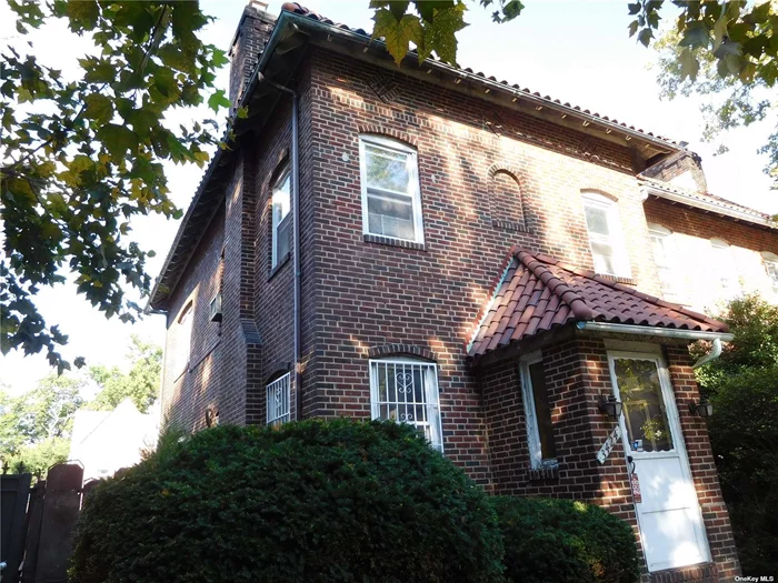 Most desirable colonial/tudor house in the beautiful tree-lined historic district of Jackson Heights, convenient location to trains 7/E/F/R/M at 74th Street Station, local buses Q49 to 74 St Roosevelt Av Terminal and Q66 to Flushing Downtown. This semi-detached house is very spacious. With windows on 3 sides of the house, the home provides a very comfortable, bright and airy living environment. There is a basement and attic with very high vaulted ceilings for a potential of additional living spaces. There are 3 parking spaces at the rear of the house (one garage space with door opener and two additional carport spaces - one covered) - very rare in this area. House is sold in as is condition.