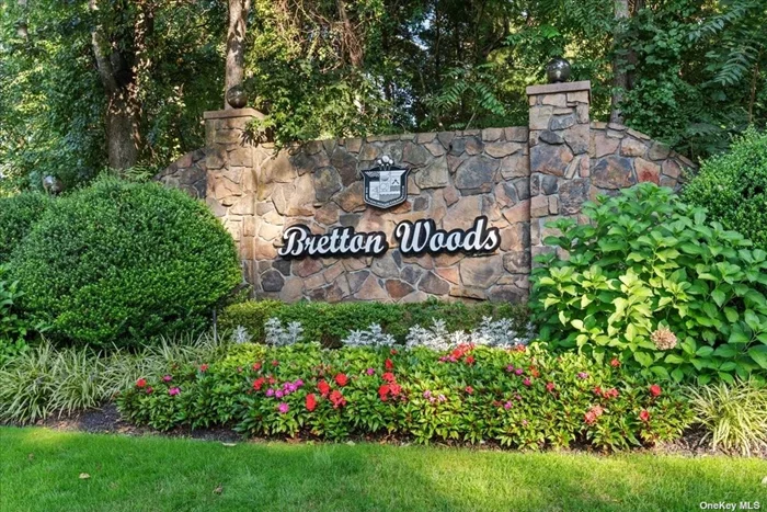 A beautifully maintained 2 bedroom 1.5 bath Cambridge model townhouse! This home is located on a very quiet secluded area of Bretton Woods with a view of the golf course. It features Laminate wood floors throughout 1st level, wood flooring on second level. Updated kitchen with brand new appliances, totally renovated half bath, laundry room with storage. Newer hot water heater. Newer central air-conditioning. Large master bedroom with walk in closets. Skylights save on electricity. Private patio with new fencing. Storage area in basement of unit. Newer windows. Plenty of parking. Country club style living. Amenities include: indoor/outdoor pools, golf, basketball courts, volley ball, tennis, bowling, bocce ball, pickle ball, kids parks, clubhouse with weight room, library, card room, playground and school bus stop and more! Middle Country School District! All this in a secure gated community. Taxes without star. Maintance is including new assessment.