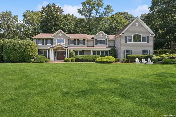 Beautifully Renovated Colonial on 1 Verdant Acre   Expanded and exquisitely remodeled, this grand center-hall Colonial with a bright and airy open floorplan has undergone numerous renovations over the last 3 years, resulting in a magnificent residence with every modern amenity. The soaring 2-story foyer, with its crisp white millwork and herringbone floor, leads to an expansive great room with a vaulted ceiling, 4 skylights, a fireplace, and 2 sets of patio doors framing glorious views of the manicured property. Boasting a spacious formal dining room and living room, this home is perfect for hosting intimate parties and large celebrations alike. Renovated in 2022, the stunning chef&rsquo;s kitchen is designed with custom cabinetry, durable quartz counters, ample display and storage space, a huge center island with additional storage and seating, high-end fixtures and fittings, professional-grade stainless-steel appliances that are energy efficient, and a delightful octagonal breakfast area with radiant heat. Adjacent to the kitchen is a thoughtfully designed walk-in pantry with plenty of storage, shelving, counter space, and undercounter wine refrigeration. The main floor also offers a guest bedroom and a spa-like full bath.  The master suite is a relaxing retreat that features a generous bedroom with 2 custom walk-in closets flanking a Helo cedar custom sauna, fabulous new office with a glass wall, a linen closet, and a spacious bath with dual sinks, a shower, and whirlpool tub. Additional bedrooms are all sizable with ample closet space and picturesque views, and all baths are tastefully appointed. The 2nd floor also houses a convenient laundry room. The finished lower level offers an amazing home gym that has commercial gym flooring and wall-to-wall mirrors.  Outdoors, the idyllic property has mature trees with specimen plantings and is ideal for alfresco entertaining with a large brick patio and pergola, outdoor kitchen with a built-in barbecue and refrigerator, and a sparkling gunite pool with a spa and gazebo. Exterior highlights include a Generac whole-house generator, maintenance-free AZEK front porch and vinyl fence enclosing the entire property, new landscaping lighting, updated security system with 14 cameras, new custom Loop-Loc super dense pool cover, Vuly and Wood Kingdom playsets, and an 11-zone irrigation system. Additional features include 5-zone HVAC, radiant heat in recent renovations, central vac, updated LED lighting with gleaming hardwood floors and gorgeous moldings throughout, and a 2-car garage  This exceptional residence is close to local beaches, golf courses, and a short drive to Northport&rsquo;s charming village that offers a myriad of dining options and shopping.