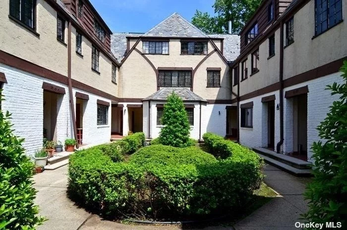 Beautifully Renovated 2-Family Tudor - Prime Location Across from Bowne Park! This beautifully renovated 3-story Tudor offers a fantastic investment with a 2-bedroom duplex over a 1-bedroom duplex. Each unit features 1.5 baths, brand-new granite kitchens with stainless steel appliances, and an in-unit washer/dryer. Enjoy the elegance of recessed lighting, new windows, and updated electrical and plumbing systems throughout. The property boasts 7 HVAC units for efficient heating and cooling.