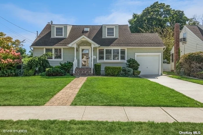 Welcome to this prestine rear dormered cape featuring 4 bedrooms and 2 full baths. Hardwood floor throughout, Oil Heat with gas hookup in the house. Tons of Storage and Central Air with a finished basement . All situated on a manicured property.