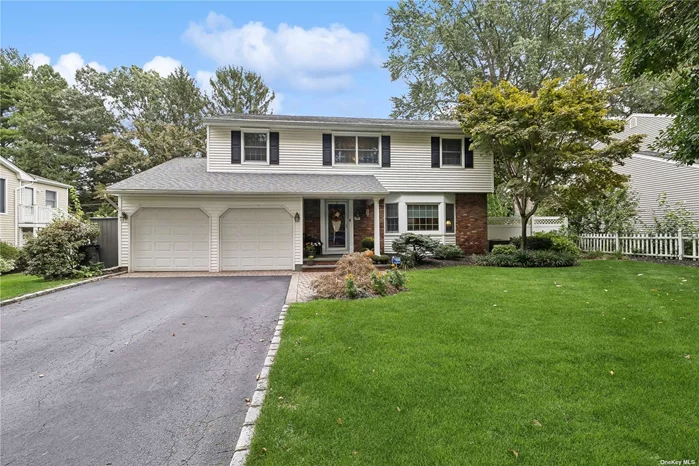 Welcome home to this beautiful expanded Colonial in the Smithtown school district. Features 4 bedrooms, 2.5 bathrooms, primary bathroom & walk in closet. Extended eat in kitchen with center island, vaulted ceilings, sliders to yard, Subzero refrigerator, Bosch Diswasher, granite countertops. Expanded sunken den/family room, high ceilings and sliders to yard. Formal living room with gas fireplace, custom mantle and stone surround. Formal dining room. Hardwood floors, CAC, 2022 Boiler, 3 heat zones. In ground Pool heated (Liner 2014, looploc cover 2020), Stone outdoor kitchen with gas bbq, 4 zone IGS, Basement with egress window, cul de sac location.