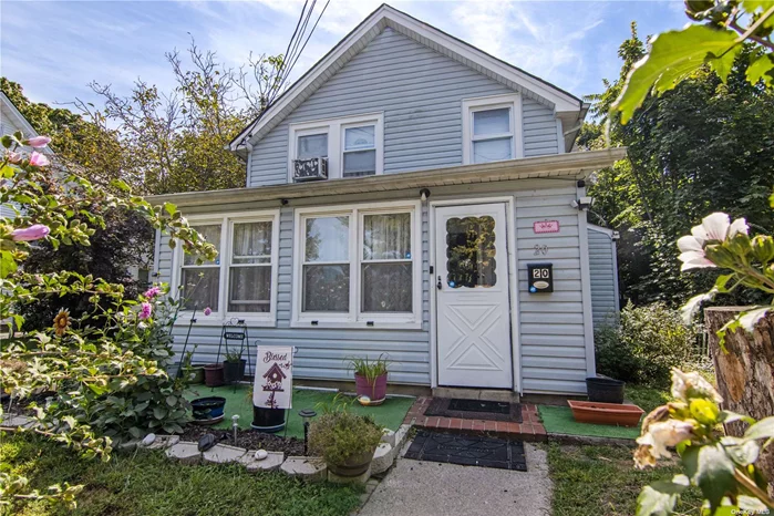 Great Opportunity To Make This Yours! Located Close To LIRR & Downtown Port Jefferson Village, The Size Of This 3BR 2BA Home Is Deceiving From The Street And Has Ample Sized Rooms With Hardwood Floors, An Enclosed Front Porch And Detached 2 Car Garage w/Driveway. Taxes Under $4500 w/STAR!