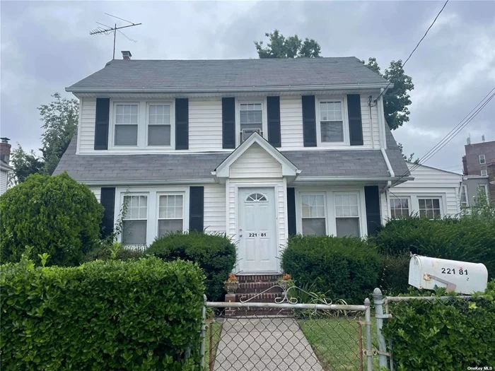 4 Bedroom, 1.5 bath Colonial home with WALK UP attic and full basement. 2 car detached garage with large driveway. Plenty of room to park your cars! Spacious property! Fully fenced in yard. SOLD AS IS condition. Close to shopping, park, public transportation, LIRR, and more! LOW TAXES