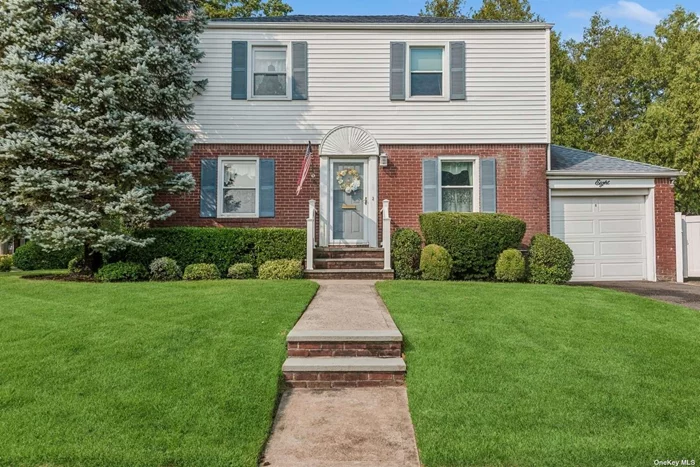 This beautiful colonial is perfectly situated on a quiet tree lined street in the eastern section of Garden City. The home features a spacious living room that flows nicely into the family room with a fireplace. The dining room, eat-in kitchen and the full bathroom complete this level The second floor boasts a primary bedroom and 2 additional bedrooms that are serviced by a full hall bathroom. The basement provides a sizable recreation room and a generous amount of storage space. The home is proximate to the school, park, shopping, and the Long Island Railroad station. The location and the low taxes make this a truly exceptional value and the perfect place to call home!