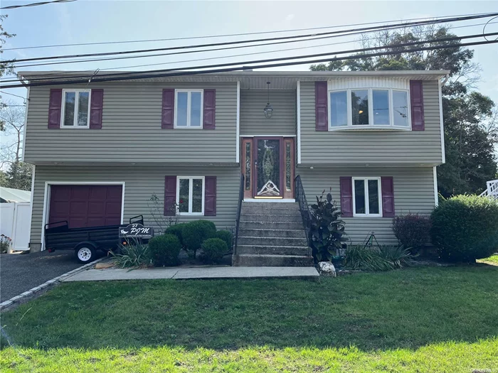 Open concept kitchen, living room and dining room with lots of windows. Jacuzzi tub in main bathroom. Washer and Dryer hook- up, Porch and patio with use of yard. Solar panels. Outside smoking only. 3 car wide driveway. 1 mile from LIE, 1.5 miles from LIRR