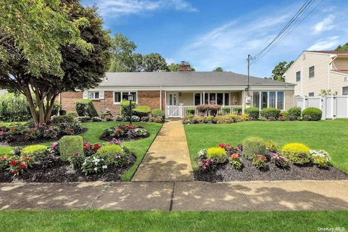 Welcome to Nassau Shores! This Sprawling Ranch sits on 87x100 of Manicured Property. Detached 2 Car Garage. There are 3 Bedrooms and 2 Full Baths (one in Primary Bedroom). Walls of Windows Showcase the 16x36 Heated Vinyl Inground Pool (2 yr old Liner) and Patio. Pool cover is 2 years old. Open and Airy Layout that has Living Room with 2 Sided Brick Wood Burning Fireplace, Banquet Size Formal Dining and a Step Down to the Den/Office. Central Air Conditioning (2016 Condenser), Updated Windows, Roof, Baths, and Oil Heating with Above Ground Oil Tank (with Protective Cover), Gas in Street, 200 Amps, All Double Closets, Electric Cooking, Stainless Refrig, Vaulted Ceilings, Handicap Bath Access, Pull Down Attic, Washer/Dryer. Flood Zone X . This Meticulous and Well Maintained Home is Centrally Located to Schools, Restaurants, Shopping, John J Burns Park, Marjorie Post Community Park, Peninsula Golf Course in Nassau Shores and the Nassau Shores Bay Front Park.