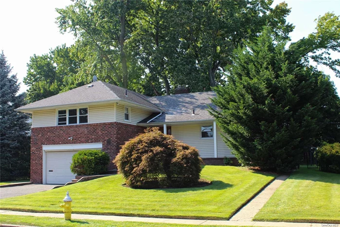 Beautiful split levels home in the village of Westbury , close to parkways, shopping areas, bus and public transportations , Fire place in the family room, central ac, new hot water heater etc... Newly renovated LIRR Train Station. Come see for yourself this unique home.