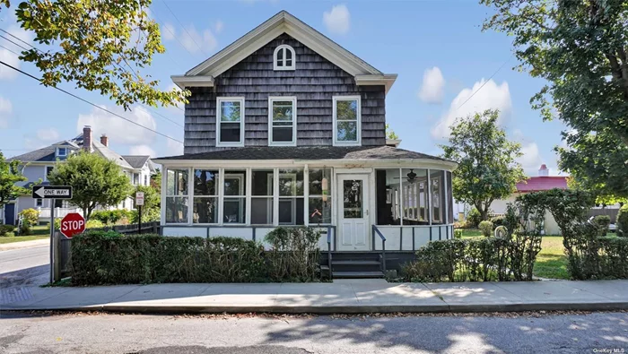 Discover a prime opportunity in the heart of Greenport Village. Surrounded by renowned restaurants, shops, beaches, and marinas. This charming farmhouse offers endless potential. It features hardwood floors, with three bedrooms, two baths, walk up attic, and a beautiful wrap-around porch, this home offers a lot of potential for personalization and creativity. A corner lot is always a bonus, providing more space and privacy. This home is located in the Historic District.