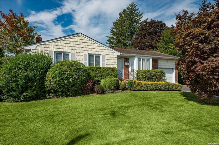 Welcome to bright and cheery sun-filled Ranch. Updated kitchen includes granite counters, bay window and skylight. Finished basement with full bath. Three main level bedrooms . Oak hardwood floors under wall to wall carpets Private, landscaped property with new 6 Cedar fencing and expansive decking, and Belgium block trimmed driveway.