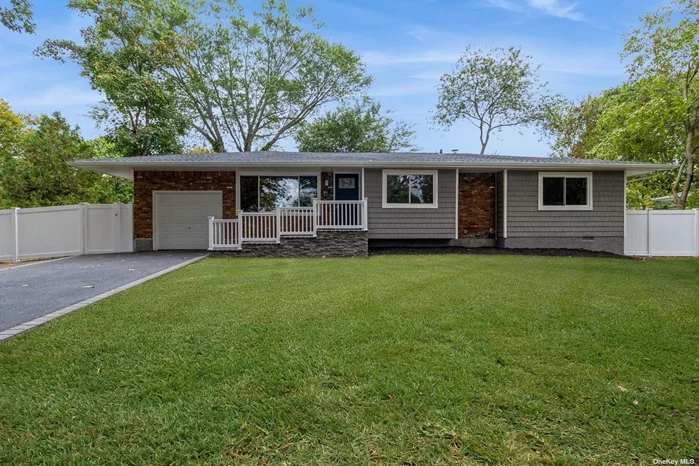 Magnificent 3 bedroom ranch completely renovated from floor to ceiling, White PVC fence, blacktop driveway lined with pavers leading to beautiful front stone porch. Brick & Cedar impression front siding, brand new vinyl siding, roof, gutters and leaders. One car Garage. New extra-large windows, hardwood floors, recessed lighting. Brand new kitchen with white shaker cabinets, quartz countertops, subway tile backsplash, stainless steel appliances. Formal living room with large sliding doors stepping onto paver porch with PVC railings. Full finished basement, brand new forced hot air system, central AC and hot water heater. Conveniently located by shops, restaurants, parks, library. South Huntington School District. Don&rsquo;t miss this wonderful opportunity.