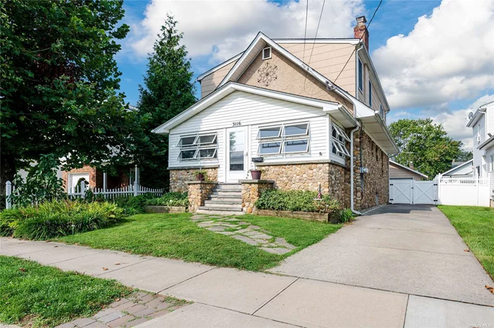 Spacious and charming, this home is on a great residential block in the heart of town with 4 bedrooms up plus a 5th on the main level, full finished basement and OH SO charming with stone exterior! Entry foyer is spectacular with beautiful stone facade, living room has wood burning fireplace and is open to the huge dining room. This is truly a one of a kind property! Basement has separate entrance and is fully finished. There is a detached 2 car garage with loft and private gardens. Great size rooms throughout. Per the current homeowner, this home was hand built by a German craftsman who brought the stones from upstate New York. Must see to appreciate! Low taxes and no flood required.