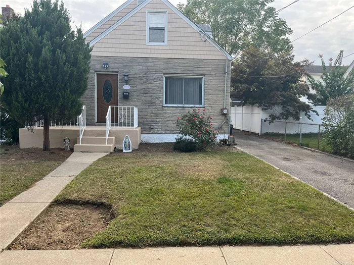 Charming 4 bedroom 2 bath house on quiet street with newly constructed homes. Detached garage, finished basement, wood floors, gas boiler and gas water heater. Close to shops and restaurants, Near LIRR, One of the best prices in the Garden City zip code!