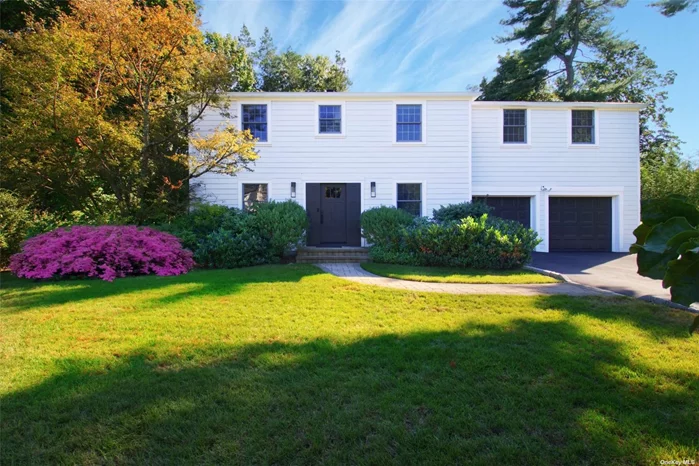 Welcome Home to this Immaculate, Chic Colonial in the Strathmore Section of East Hills. Enjoy Impressive Interior and Exterior Updates in a Prime and Private Mid-Block Location. The Heart of the Home is the Stunning Kitchen, Newly Renovated with Miele and Sub-Zero Appliances, Custom French Glass Upper Cabinets, Quartz Countertops and Slab Backsplash, Fluted Wood Island with Seating for Four, Custom Pantry area, all with Radiant Heated Large Format Porcelain Tile. A Large Office (Potential 5th Bedroom) off of the Side Exterior Entry Allows for a Comfortable Work From Home Option or Guest Quarters. Formal Dining Room, Living Room with Wood Burning Fireplace, Cozy and Bright Den and Updated Powder Room Complete the First Floor. Upstairs Includes a Large Primary En-Suite Addition with Newly Renovated Marble Bathroom featuring a Custom Double Vanity, Enclosed Steam Shower With Rainhead, Waterworks Fixtures and Toto Toilet, as well as 3 Additional Bedrooms and a Full Hall Bath. Beautifully Re-Finished Wood Floors and Freshly Painted Interior throughout. 2021 Natural Gas Conversion (New Gas Burner, Cooktop Hookup, Full House Gas Generator.) Exterior Updates Include Hardie Plank Siding, Anderson Windows, 40 Year Roof (Under Warranty), Exterior Doors, Perimeter Fencing, Paver Walkways and Back Patio. Bonus Upgrades include an Air Purification System, Water Filtration System, Smart Home Features, LED Lutron Lighting and Updated Electrical System. Enjoy Roslyn Schools, East Hills Park Membership and LOW TAXES!!