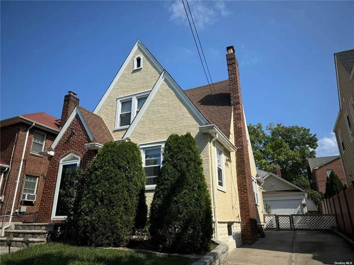 This beautiful single-family home in North Flushing is now available! 40X100 beautiful lot with the first floor offers a living room, dining room, kitchen with access to the backyard, and a powder room. The second floor features 3 bedrooms and 1 bathroom and a pull down attic, while the full finished walk-out basement includes a full bathroom. The property also boasts a garage, private driveway, and a lovely backyard with organic tomatoes and Fig tree. Situated in the more desirable North Flushing area, it is conveniently close to schools, parks, restaurants, supermarkets, multiple bus stops, and the LIRR, making commuting and daily living a breeze.