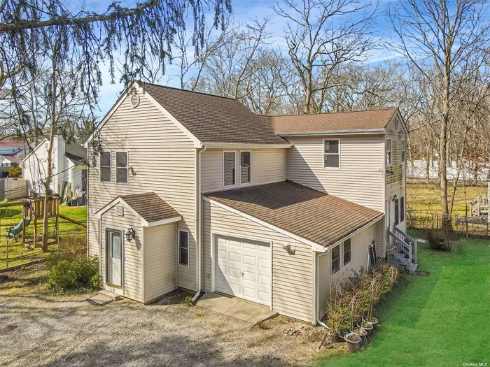 This charming 3-bedroom, 2-bathroom Colonial home is located on a quiet street in Mastic Beach with many updates done in 2018. The home features a spacious living room with vinyl floors and large windows that let in plenty of natural light. The kitchen is updated with stainless steel appliances, a large sink, and plenty of cabinet space. The unique Master Bedroom has plenty of closet space for everyone, and the two additional bedrooms are generously sized and share a full bathroom with fully tiled tub/shower combo. The backyard is a must for anyone who loves to be outside and bbq on the beautiful summer days. Conveniently located near local shops, restaurants, parks, and beaches, this home is perfect for those looking for a peaceful retreat while still being close to amenities. Don&rsquo;t miss out on the opportunity to make this lovely house your new home! Taxes are extremely cheap! This home is a MUST SEE!!