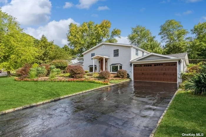 New to the market: this is a one-of-a-kind, turnkey 5 bedroom Dutch Colonial-style residence, brimming with timeless charm and modern conveniences. Built in 1968 and meticulously updated, this exquisite home is located at 33 Ivy League Lane in the heart of Stony Brook. Nestled within a serene, tree-lined neighborhood, this property offers the perfect blend of classic architectural details and contemporary conveniences. Thoughtfully enhanced with extensive upgrades, it boasts an array of attractive features that elevate its appeal, making it a home for families & homeowners seeking both style and comfort. Size and Layout: 5 bedrooms, 3.5 baths 2-car insulated garage with a new professional epoxy floor, Large kitchen with custom cherry cabinets and high-end appliances, Finished part basement (640 sq ft) with radiant floor heating and rooms for exercise, storage, and a workshop, 1200+ sq ft addition with open floor plan, .35-acre secluded and private rear yard Recent Upgrades: New 50-year roof (2021) with upgraded gutter system and leaf guards, New exterior plywood and insulation, Radiant floor heating with 8 zones, Rinnai tankless water heater and high-efficiency burner, Upgraded electrical system, including 200k and 150k in electrical upgrades with digital switches and hi-hat lighting, Unico central air conditioning (which removes 30% more humidity) Exterior Features: 6 ft chain link fence, 3 legal conforming sheds, 11-zone sprinkler system, 5 outside water spigots and electrical outlets, 2 double ring cesspools with a separate 1000-gallon dry well for laundry, 2-car driveway, Interior Details: Fireplace with natural gas, Custom built-in cherry cabinets with a wet bar in the dining area and den, Full network setup with alarm, cable, and CAT 5E wiring. Don&rsquo;t miss out on this very well-maintained and spacious property with numerous modern upgrades, making it highly attractive and low taxes.