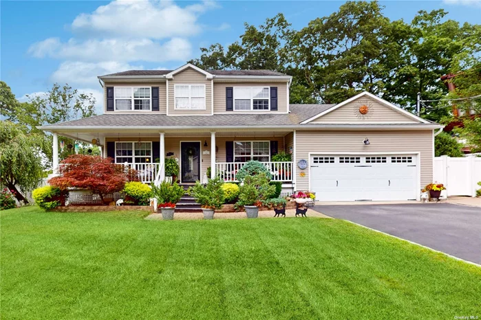 This stunning colonial home offers a perfect blend of elegance and modern comfort. Featuring three bedrooms, three-and-a-half baths, and a two-car garage, this property is truly move-in ready. The exterior boasts a boulder brick-lined asphalt driveway, complemented by a spacious cement side driveway that accommodates up to four vehicles. A brick walkway leads to a welcoming wrap around front porch, ideal for enjoying views of the professionally landscaped front yard. The interior begins with a grand two-story foyer, featuring a bridge that adds a dramatic architectural touch. On one side is a formal dining room, and on the other, a formal living room, both designed for elegant gatherings. The updated kitchen includes modern lighting, a Wolf gas stove, granite countertops, stainless steel appliances, a large farmhouse stainless steel sink with a pull-down faucet, and custom cabinets. The dining area opens to the rear deck through sliding doors, providing seamless indoor-outdoor living.  The open-concept design flows into a spacious family room, creating a comfortable and inviting living space. Upstairs, the principal bedroom features vaulted ceilings and a private en-suite bath. Two additional bedrooms, ample closet space, and a beautifully designed landing area complete the upper level, all featuring hardwood floors and crown molding throughout. The finished basement includes a modern laundry area with a large front-loading washer and dryer, an 80-gallon hot water heater (10 years old), and a furnace updated in 2023. The air conditioning system, replaced in 2022, operates on two zones for optimal comfort year-round. The outdoor space is equally impressive, with a six-zone irrigation system, a spacious backyard featuring a gazebo, and brick-lined cement patios ideal for entertaining. Additional access from the garage to the backyard provides convenient storage and functionality. An automatic garage door opener and ample room for outdoor activities further enhance the appeal. This meticulously maintained home offers a timeless setting to relax, grow, and enjoy. All updates have been thoughtfully completed, ensuring a beautifully crafted and ready-to-move-in residence.