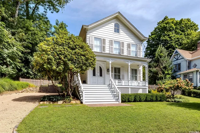 Be prepared to fall in love with this circa 1842 historic beauty set back along a large circular driveway on .40 acre, accessible from the front (Main St) or rear (Hawkins Rd). Many of the fine architectural details of this home are still present today! All original historic windows recently fully restored, aesthetically and operationally rebuilt and repaired, with refurbished hardware and salvaged glass. Full attic with all original pine flooring. The backyard boasts stunning specimen plantings and hardscaping, all artfully arranged, with 24 zone wifi irrigation system. Honeywell alarm system, new furnace firebox, 275 gallon oil tank outside, dehumidifier built in for walk-out basement. Conveniently wired with ethernet ports throughout for home networking with basement server closet. Designer lighting, fixtures, and window treatments. Modern EIK offers Viking gas stove, marble island, and large walk-in pantry/barista area/laundry. Walk to harbor, fine restaurants, live theatre, shops and parks. Minutes to LIRR, University, Hospitals, and PJ/Bridgeport Ferry. Enjoy private resident-only beaches and golf course! Renowned Port Jefferson School District. This home will truly satiate your antique lover appetite!