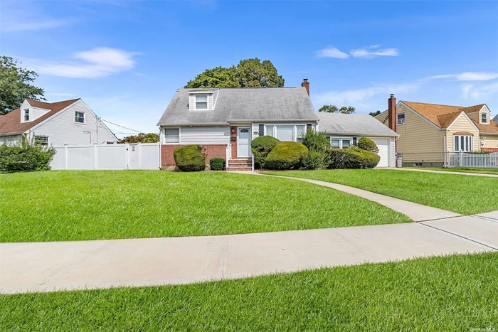 Welcome to 739 Planders, a beautifully updated home that combines classic charm with modern upgrades! The inviting front exterior boasts newly redone concrete steps, walkway, and driveway, leading to a garage with an automatic opener. Inside, enjoy the elegance of crown molding on the first floor and hardwood floors throughout the main level. The custom-built bar in the finished basement, complete with quartz and glass countertops, a sink, an undermount refrigerator, and ambient lighting, is perfect for entertaining. The property is secured by high-definition cameras strategically placed around the exterior. The home also features a ductless air conditioning system on the main level and basement, providing year-round comfort. Outside, the oil tank has been relocated for convenience, and the updated electrical panel and wiring ensure safety and efficiency. This home is ideally located near Smith Street Elementary and Turtle Hook Middle School. Don&rsquo;t miss this opportunity to own a stylish and secure home in a wonderful neighborhood!