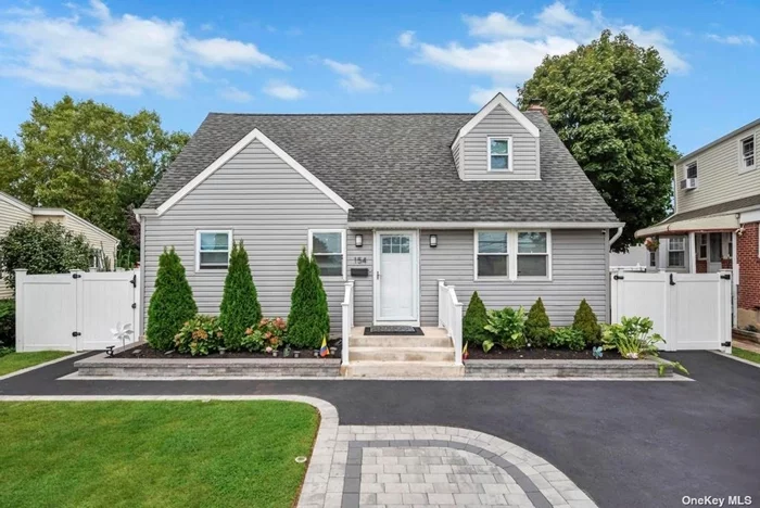 Welcome to 154 Guilford Ct, beautifully renovated expanded cape in a desirable neighborhood with Franklin Square Schools! This home was fully renovated 3 years ago, featuring an open layout with beautiful hardwood floors and electric heat with a heat pump air system. The home includes 4 generously sized bedrooms and 3 updated bathrooms. The renovation included new windows, insulation, plumbing, vinyl siding, central A/C, upgraded 200-amp electrical service, and a new roof. Enjoy the cozy wood-burning fireplace in the large completely CO&rsquo;ed Extension for living room. The full finished basement, with an outside separate entrance and an additional bathroom, offers endless possibilities for extra space or recreation. Additional highlights include a detached 1-car garage, a 3-car driveway, and a lovely backyard with permitted pool perfect for entertaining. This move-in-ready home has all COs in place!