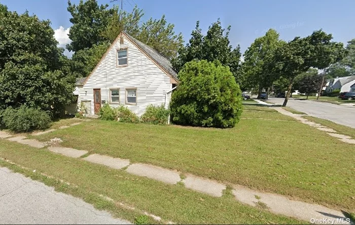 Needs Full Renovation. 4 Bedroom 1 Bath cape. 1 car detached garage.