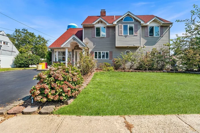 Welcome to 21 Bird Lane, a stunning 5-bedroom Colonial with mother/daughter potential. With upgraded vinyl siding and Andersen windows, the home exudes curb appeal. Enter inside to a freshly painted first floor featuring wood and Pergo floors, new interior doors, and moldings. The primary bedroom is a spacious 12x28 retreat with a large den, and the renovated bath boasts a Jacuzzi tub and separate shower stall. Head outside through sliders to a beautifully landscaped, park-like yard complete with a patio-perfect for relaxing. The home also features a large attic for ample storage. Enjoy the comfort of a 200-amp electrical system, an 8-year-old boiler, and oil heating with forced air. Located near Dutch Lane Elementary and the Abe Levitt Baseball Field, this home combines comfort, style, and convenience in a fantastic Hicksville neighborhood. Don&rsquo;t miss out on this rare opportunity!