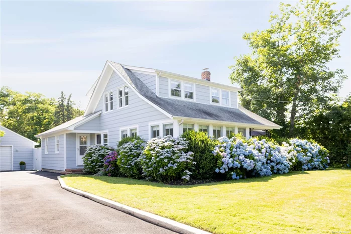 Nestled among countless beautiful hydrangeas, this charming 4 bedroom cape is located on one of the North Fork&rsquo;s most coveted bucolic roads, Alvah&rsquo;s Lane. The half acre features mature landscaping, a large swimming pool, outdoor shower and full vegetable garden. The home is bright and airy with loads of natural light and features a living room with a wood-burning fireplace, a large dining room, a separate family room, and a lovely kitchen overlooking the backyard. There is a first floor bedroom complimented by 3 guest bedrooms on the 2nd floor. Close in proximity to many of the regions best amenities including 8 Hands Farm, Sang Lee, Bedell Cellars and downtown Cutchogue, New Suffolk and Mattituck&rsquo;s Love Lane. Beautiful Sandy bay beaches are less than 5 minutes away.