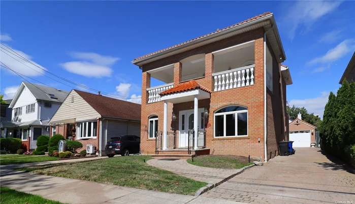 Rebuilt in 2005 Brick structure. Sun-drenched South facing 4 beds 4 full baths within the prestigious Robinwood neighborhood of Beechhurst. Building size 25X45. BSMT: 2 rooms/ mechanical room/ laundry/full bath/ central vacuum/den...First floor: 2 beds/ 2 living/ full bath/ kit... Second floor: Master ensuite with walk-in closet/home office/bed/full bath/ access to a huge south-facing balcony... Pull-down stairs attic. Close to mall, public transportation/major highways.All Information Is Deemed Reliable But Is Not Guaranteed. Buyer Is Advised To Verify The Accuracy Of All Information Independently.