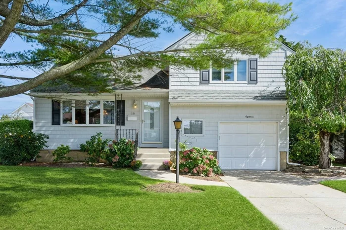 This split-level home, located on a tree lined street, is waiting for a new owner. Beautifully sided and nicely manicured exterior, checks off all the must-haves. This home boasts 3 bedrooms, 1.5 baths, LR, DR, Kitchen, Family Room, Finished Basement and 1 Car Garage. The main level offers a Living Room to entertain. The spacious Kitchen has a pantry and light maple cabinetry. The Dining Room can hold 8 to 10 people sitting comfortably. The lower level has French Doors in the Family Room that lead to a patio and yard. A Guest Bath is also on this level. The upper level has two bedrooms, a primary and second with double closets, and a full bath. The hall leads to the steps where you will find the upper level third bedroom. This home was recently painted, new window treatments were installed, and hard wood floors are throughout the home. Plainedge School district TOBAY Beach, restaurants, shopping are nearby.