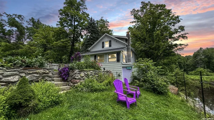 Situated in the tranquil Hudson Valley, New York, this creekside residence offers a peaceful retreat surrounded by nature. With its sunlit rooms and charming wooden beams, the house exudes a warm and inviting atmosphere. The living room grants access to a deck overlooking the creek, while the backyard provides a perfect setting to relax and immerse oneself in the soothing sounds of nature. This serene getaway offers plenty of space for exploration, embracing the essence of rural living. Additionally, its convenient location just minutes away from top attractions makes it an ideal home base for exploring wineries, markets, and picturesque hiking trails. *Please note that Property is actually located in Staatsburg, NY 12580 in the Clinton Hollow, NY 12578 area, which is north of Hyde Park*