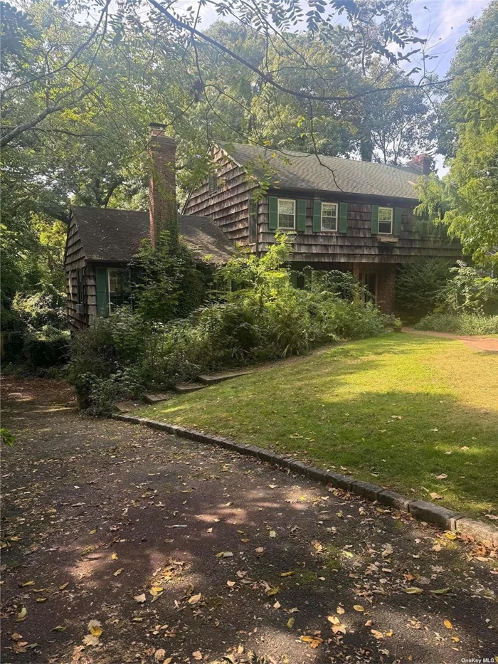 Oversized 4 bedroom 2.5 bathroom colonial with walkout basement situated on flat .46 acre property in the heart of Cold Spring Harbor. Property being sold in as is condition. Perfect to customize your dream home or for investors. This will not last!