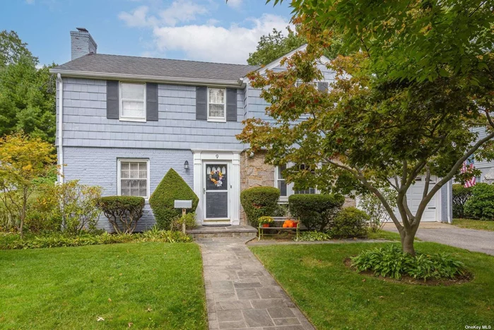 Step into a charming colonial situated on a picturesque, tree-lined street in the heart of the Village of East Williston. The foyer leads to a formal living room with a wood burning fireplace and wide plank inlay oak flooring. The formal dining room is adjacent to the kitchen which opens up to a spacious, yet cozy family room. The first floor is finished off with a bedroom (currently being used as an office) and a powder room. Upstairs there is a primary bedroom with a primary bath, along with two additional bedrooms and a hall bath. Hardwood floors, crown moulding, CAC, full basement, walk-up attic, 2 car garage, gas heat and separate hot water heater are some features of this classic home. Located in the Wheatley school district with an amazing location, close to LIRR, shopping, restaurants, schools, library and parks.  This home is a must-see!