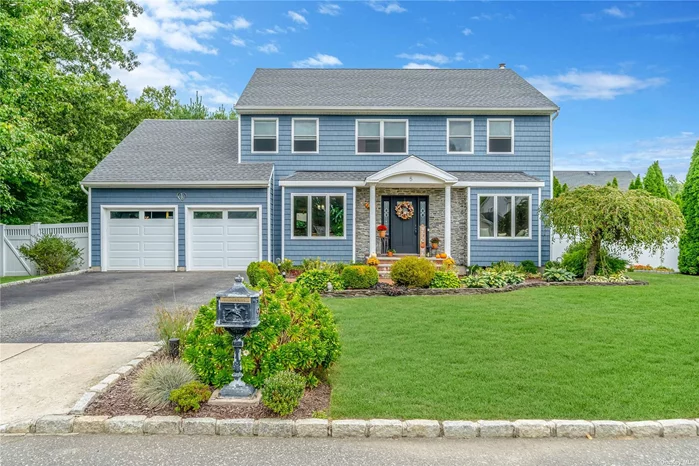 Welcome to 5 Jones Avenue, a beautifully updated 4-bedroom, 2.5-bath colonial nestled in a quiet nook of Port Jefferson Station.This home features a modern open-concept floor plan, perfect for both everyday living and entertaining. The primary bedroom features a completely renovated on suite and walk-in closet. The exterior has been fully renovated with new vinyl siding, roof, gutters, windows, screens, sliding doors, and air conditioning - all updated within the last year. Enjoy outdoor gatherings on the Trex deck, installed in 2019, and step inside to find beautiful hardwood floors throughout. The kitchen boasts updated appliances, all less than three years old, while the freshly painted interior enhances the home&rsquo;s bright and welcoming feel. Additional highlights include a 2-car attached garage and plenty of storage. Conveniently located near shops, public transportation, the railroad, parks, and schools... a peaceful setting close to everything you need makes this the perfect place to call home!