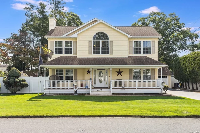 Welcome to 1427 5th Street! This charming 5 bed, 2 bath colonial has major curb appeal and boasts an expansive covered front porch. The kitchen is open concept, complete with granite countertops and flooded in natural sunlight. The second level features a spacious primary bedroom with a large walk-in closet. Other highlights include a partially finished basement, hardwood floors, a roomy 2 car garage, and 3 zone heat. Commute to work? A quick drive to the LIRR will get you there on time!