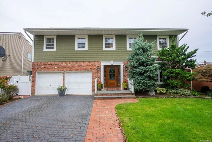 Six actual, complete, large-sized bedrooms on the 2nd. Floor! Center Hall Colonial. Completely finished basement with a permitted full bath rear exterior entrance, zoned heat, 8 ft. ceilings,