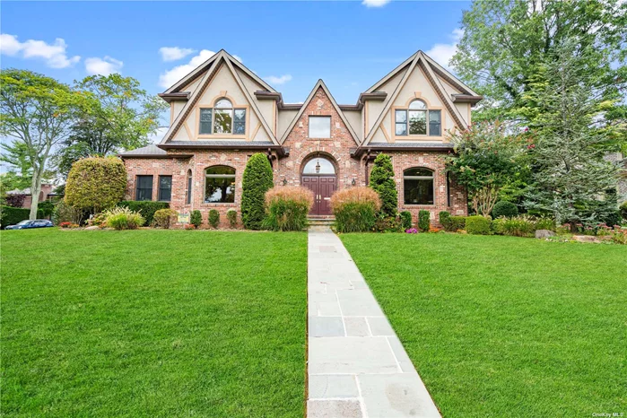 Center hall Colonial in Roslyn Country Club development. Two-story grand entrance with crystal chandelier adds an elegant touch right from the start. Electric lift for chandelier is a real bonus. With 4800 sq ft of living space, the home is bright and spacious, and the natural gas heat along with the Generac generator provide great comfort and reliability.  Hardwood flooring thru out. The first floor offers a fully equipped kitchen with center island & top of the line appliances perfect for cooking and entertaining. The versatility of the extra main floor room as a bedroom or office, along with a full bath on same floor is another added bonus. On the second floor, the primary suite stands out with its radiant heated bathroom floor and 2 walk in closets. The additional four bedrooms & two baths make the home ideal for multigenerational family or guests. The finished walk out basement, complete with heat and air conditioning, is a valuable extension of living space. The .38 acre yard,  lined with lush trees, creates a beautiful outdoor space, perfect for relaxing on the patio. This home is a truly well-designed for comfort, luxury, and practicality!!