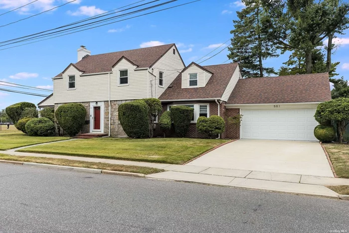 Discover this beautifully maintained colonial, situated on a spacious corner lot. Step inside to find newly installed floors and windows. The first floor layout features and updated kitchen, a dining room, formal living room with a wood-burning fireplace, den/office, and bath. Upstairs, you&rsquo;ll find three generously sized bedrooms and a modern, full bath. The full basement provides additional living space, including an updated, state-of-the-art laundry room. Must be seen! Outdoors, enjoy the expansive, flat backyard-ideal for entertaining-featuring a patio with an awning. Attached to the home is a two car garage. Located just minutes from parkways, the LIRR station, and Eisenhower Park, this move-in-ready gem won&rsquo;t last long!